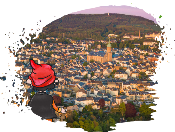 Eine Zeichenfigur blickt über Annaberg