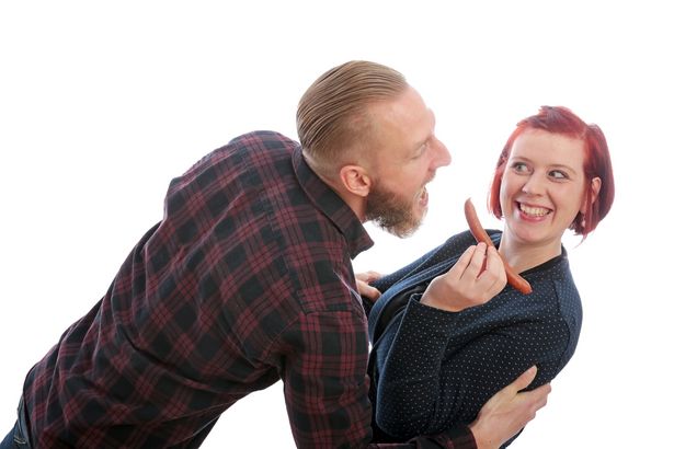 Couple eating the local sausage variety of Kamenz